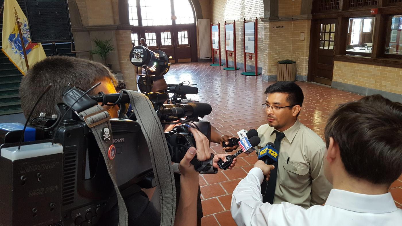 Rob speaking with the press at a terminal reopening in 2016.