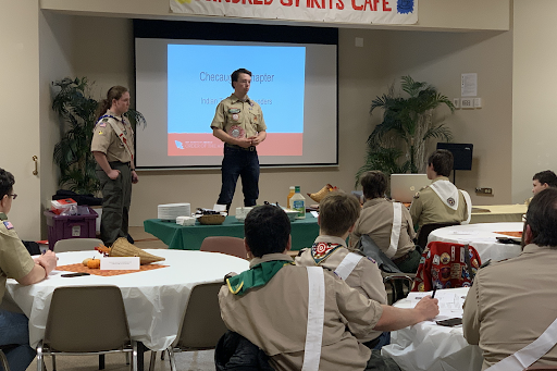 Arrowmen giving presentation about OA Representatives to other Arrowmen