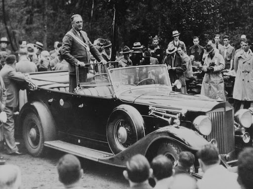 President Franklin D. Roosevelt, a new First Degree (Ordeal) member, speaks to Arrowmen of Suanhacky Lodge at Ten Mile Scout Reservation.