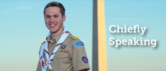 The National Chief Zach Schonfeld standing next to the washington monument.